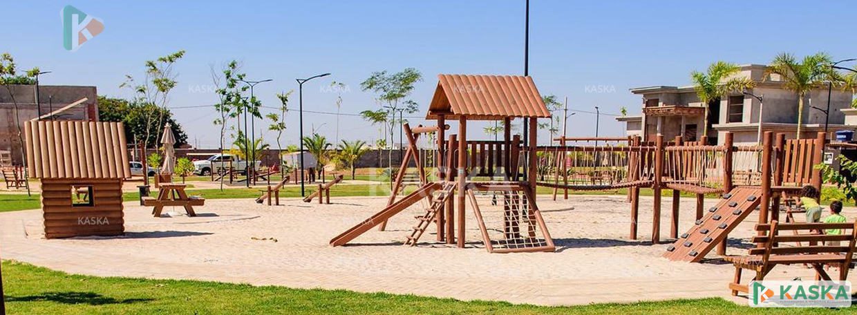 Image of a wooden playground with a blue sky