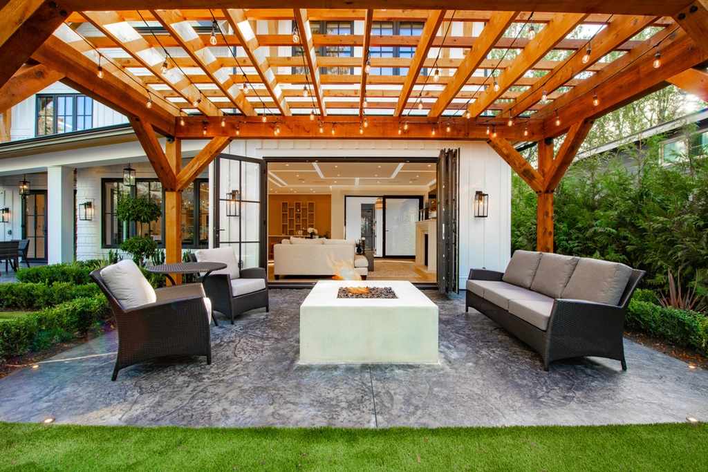 Photo of a wooden pergola in an elegant outdoor setting
