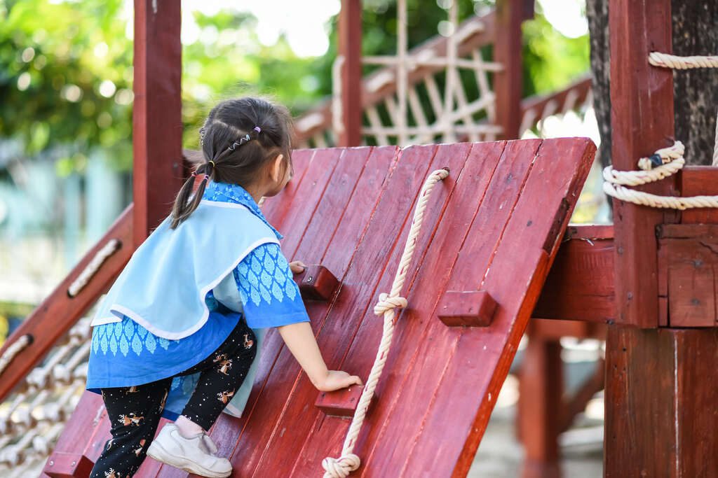 children having fun in a hotel playground